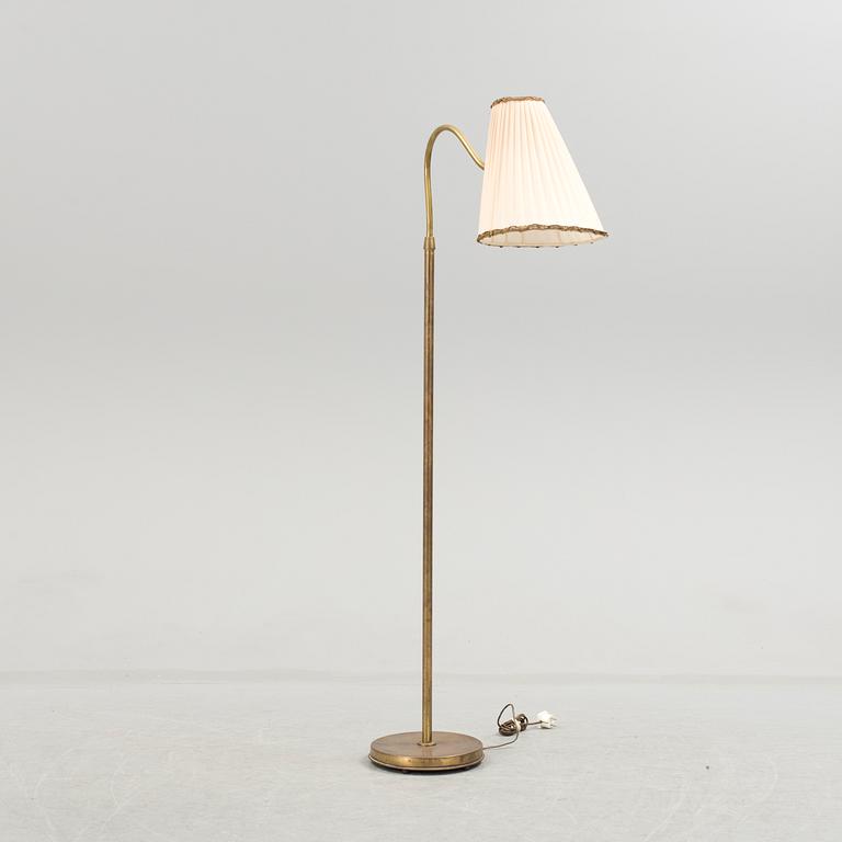 A Swedish 1930/40s brass floor lamp marked B E M.