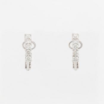 Brilliant-cut diamond earrings.