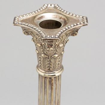 A pair of English silver plate candlesticks, probably first half of the 20th century.