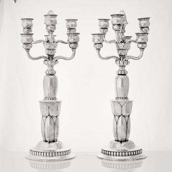 Georg Jensen, a pair of six lights silver candelabra, Copenhagen 1920, design nr 38.