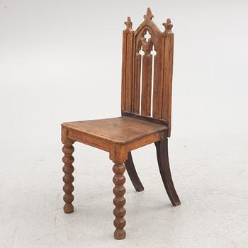 A carved Gothic-revival chair, 1830's/40's.