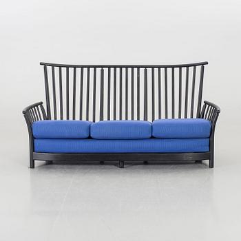 A LUCIAN ERCOLANI SOFA.