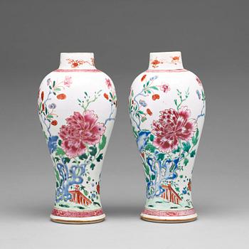 727. A pair of famille rose vases, Qing dynasty, Qianlong (1736-95).