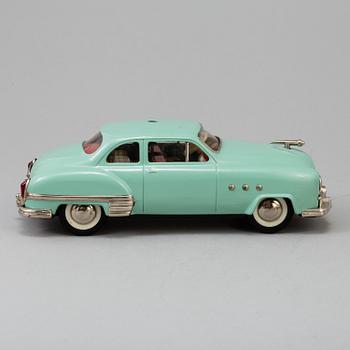 a Schuco "Elektro Ingenico 5311" car, Germany ca 1950.