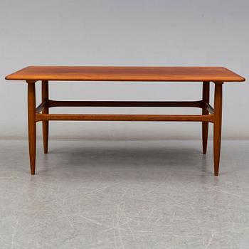 a teak coffee table from Denmark in the second half of the 20th century.