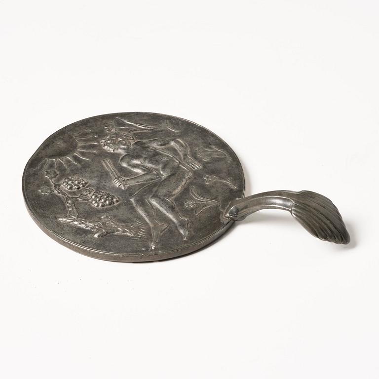 Nils Fougstedt, a pewter hand mirror model A 508, Firma Svenskt Tenn, Stockholm, 1920s-30s.
