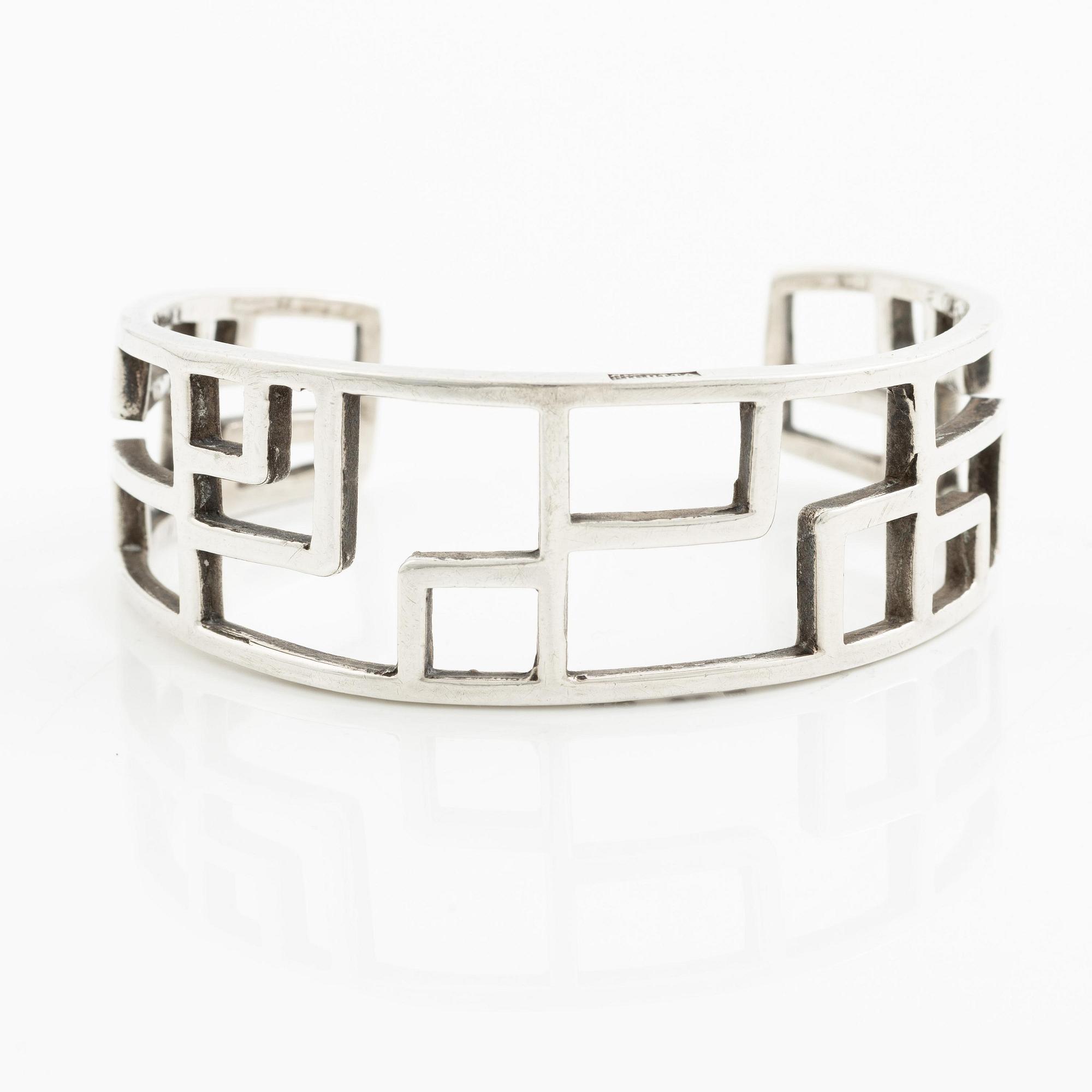 Claës E. Giertta, a ring and a bangle, silver, Stockholm 1961 and 1965.