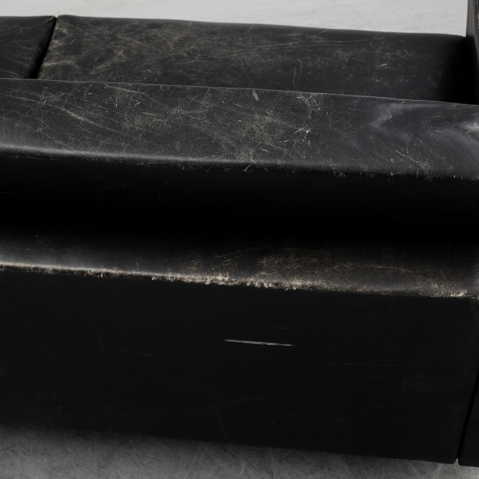 A 1960's leather covered sofa.