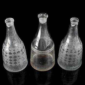 A set of three (2+1) bottles, 19th Century.
