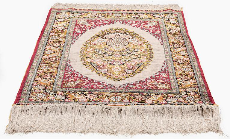 A semi-antique Hereke souf, silk and metal thread rug, West Anatolia, c. 121 x 75 cm.