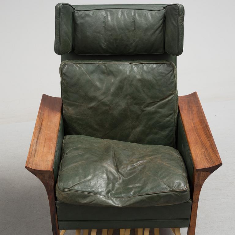 A 1960's Danish sofa, with 2 easy chairs and 2 tables by Glostrup.