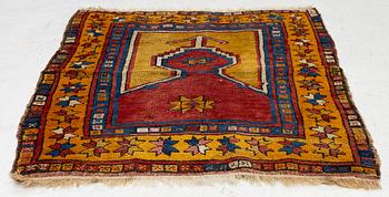 An antique prayer rug, central Anatolia, c.. 92 x 77 cm.