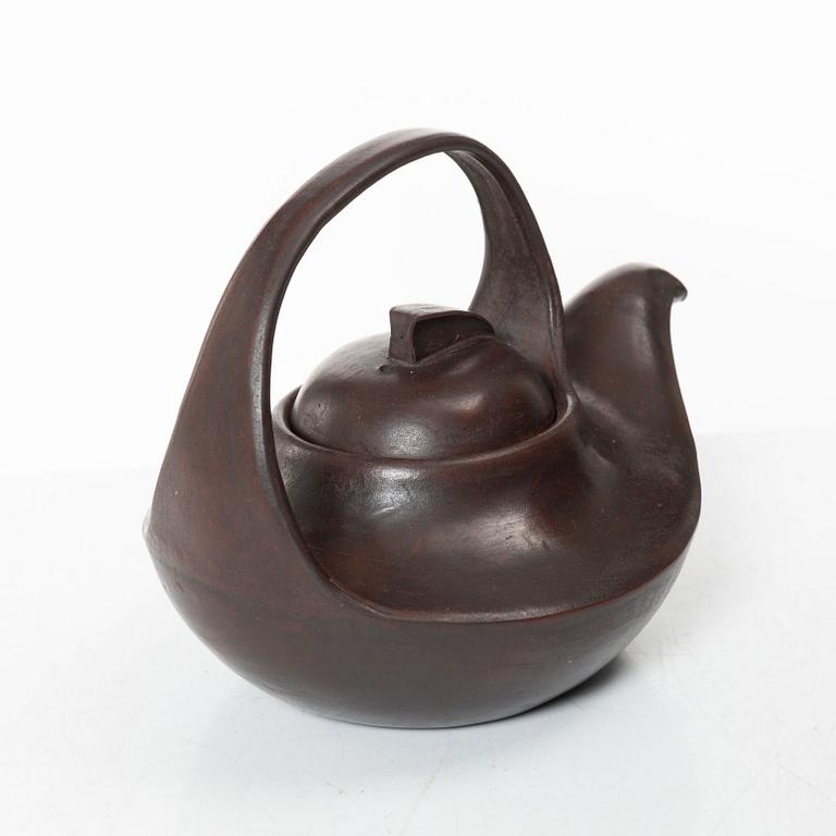 A Chinese compressed yixing teapot and cover, 20th century.
