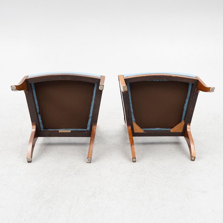 A pair of Baltic late Empire mahogany open armchairs, ca 1840.