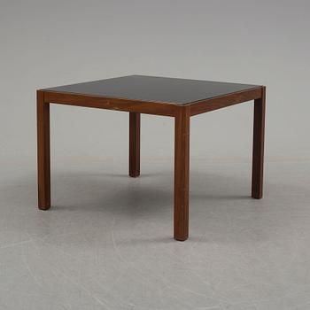 A 1960's teak coffee table with glass top.