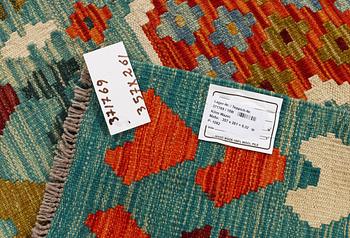 A Kilim carpet, c. 357 x 261 cm.