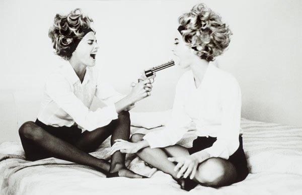 Ellen von Unwerth, "Linda and Christie with Toy Gun, Cannes, 1990".