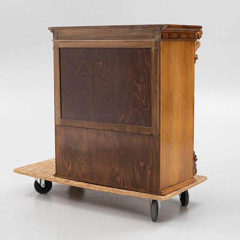 A mid 20th century bar cabinet.