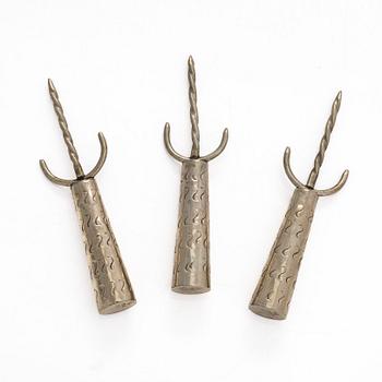 Napkin rings, 9 pcs, silver, Finland and Germany 1898-1968, and corn forks, 3 pcs, sterling silver, Mexico.