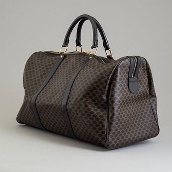 a CÉLINE weekend bag.