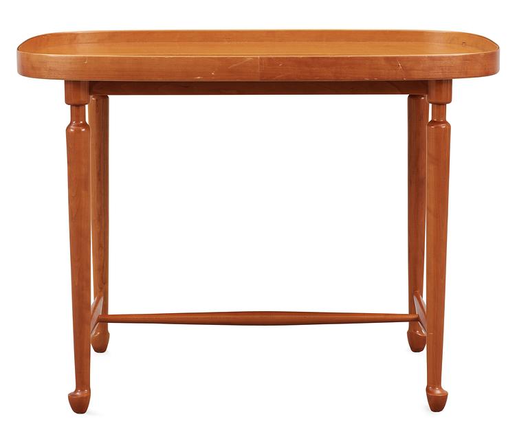 A Josef Frank mahogany table by Svenskt Tenn.