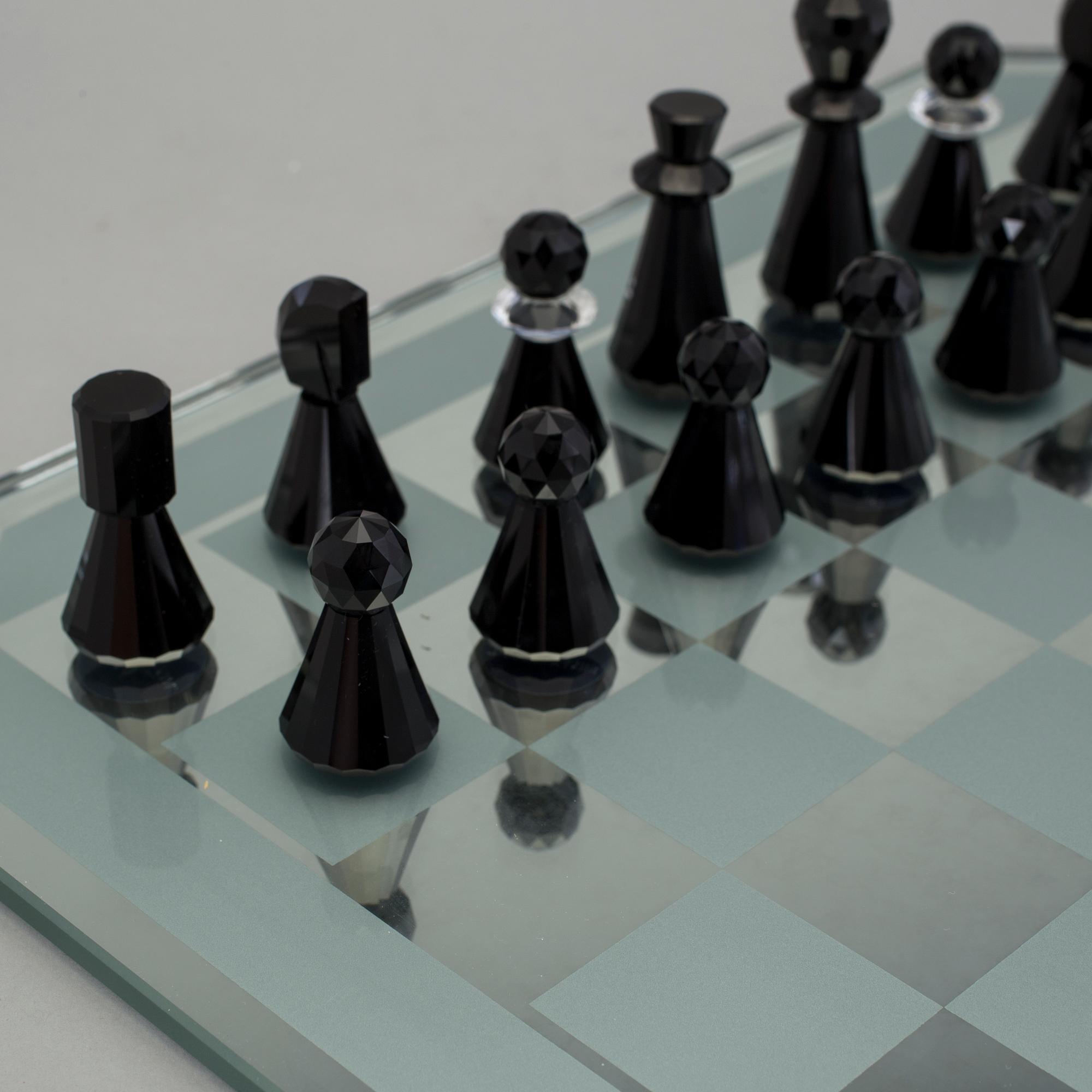 A SWAROVSKI CHESS SET.
