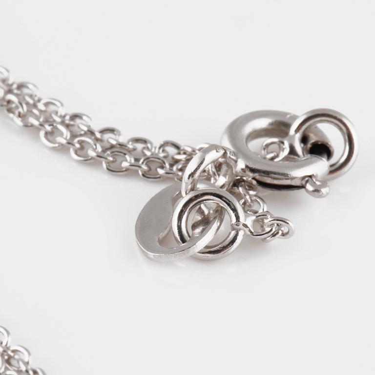 COLLIER, 18K vitguld med gammalslipad diamant ca 0.55 ct. Vikt 2,4 gram.