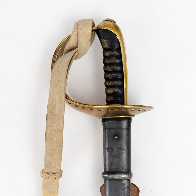 A Swedish 1893 pattern cavalry sabre, with scabbard.