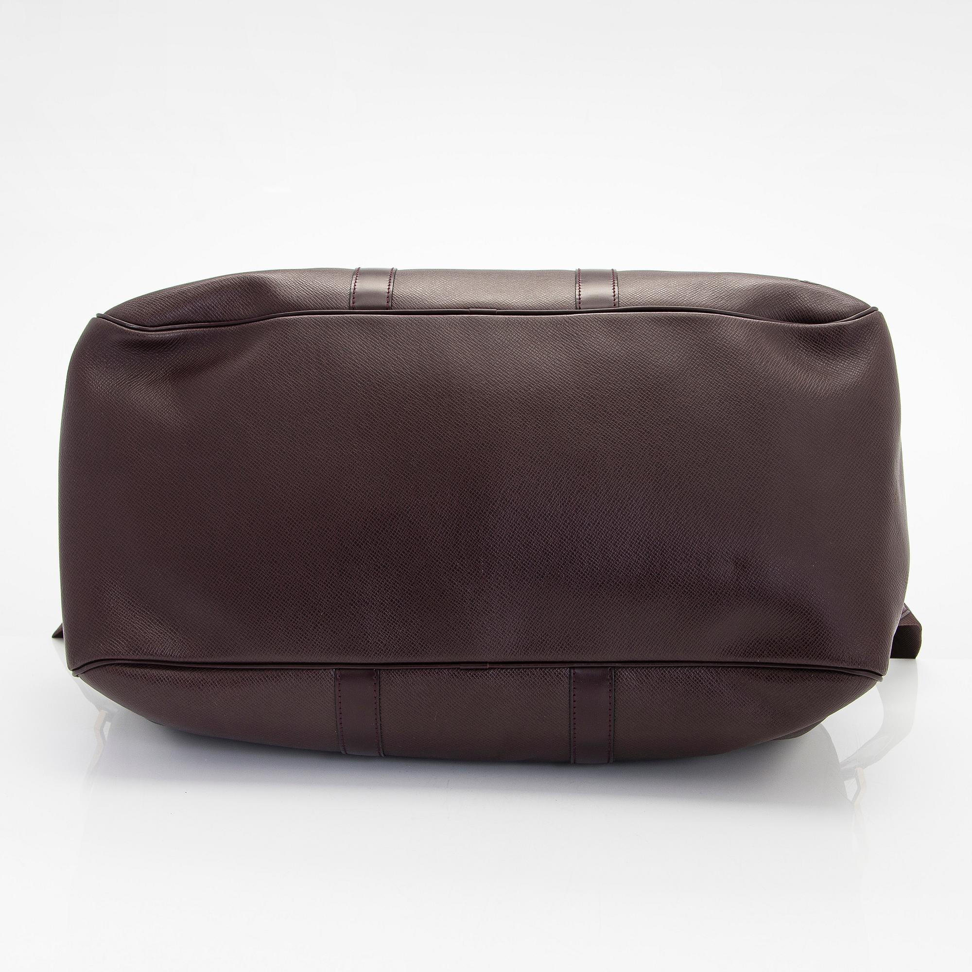 Louis Vuitton, a 'Taiga Kendall PM' weekend bag.
