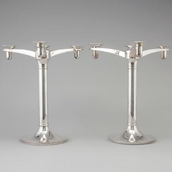 RICHARD FOX, a pair of three armed, four light sterling candelabra, London, 2001 and 2013.