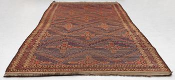 An antique Beshir carpet, ca 495 x 206 cm, around the year 1875.