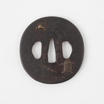 A round iron tsuba, mei, Japan, Edo period (1603-1868).