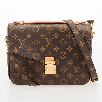 Louis Vuitton, a Monogram Canvas 'Pochette Metis' bag.