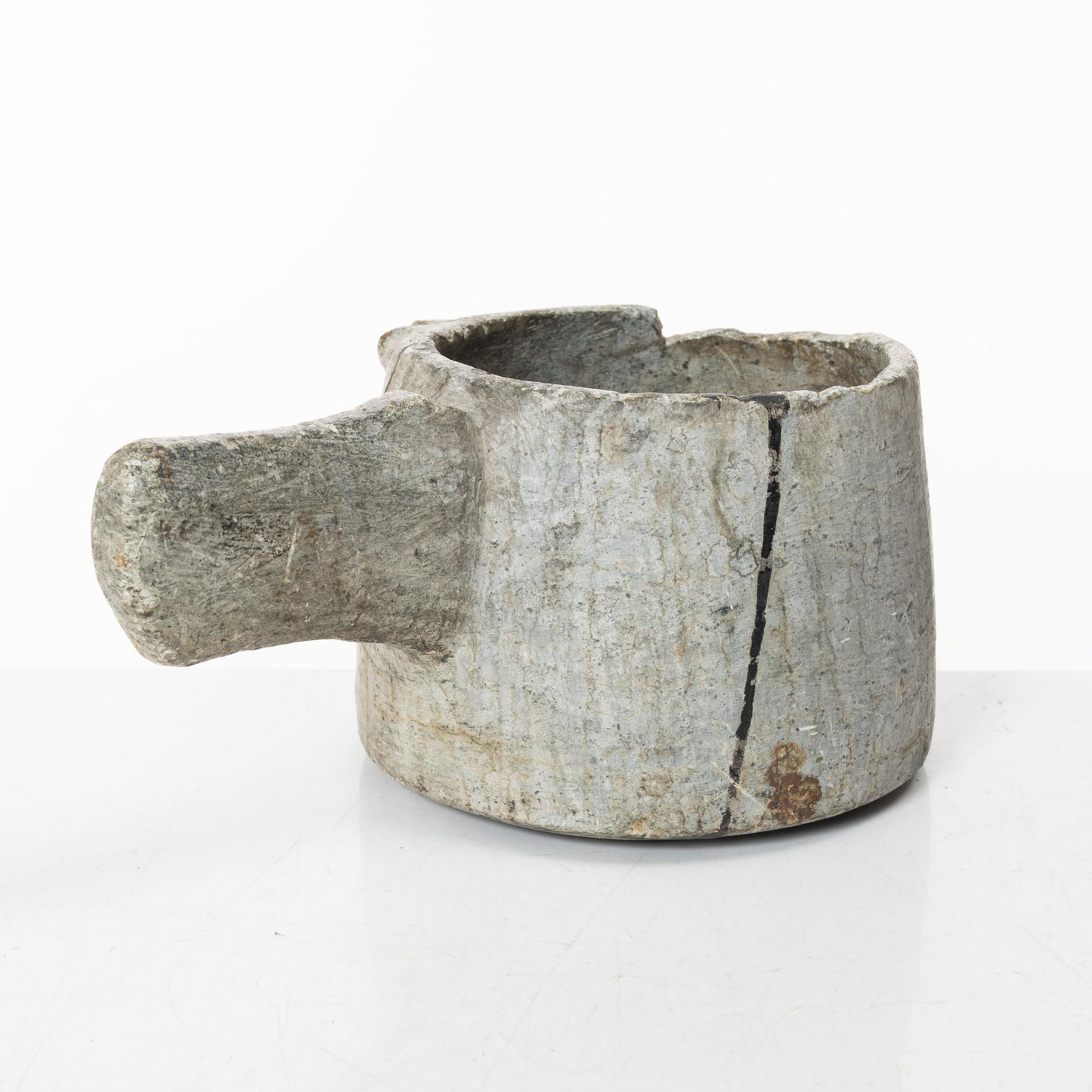A Swedish carved soapstone jug, 19th century.