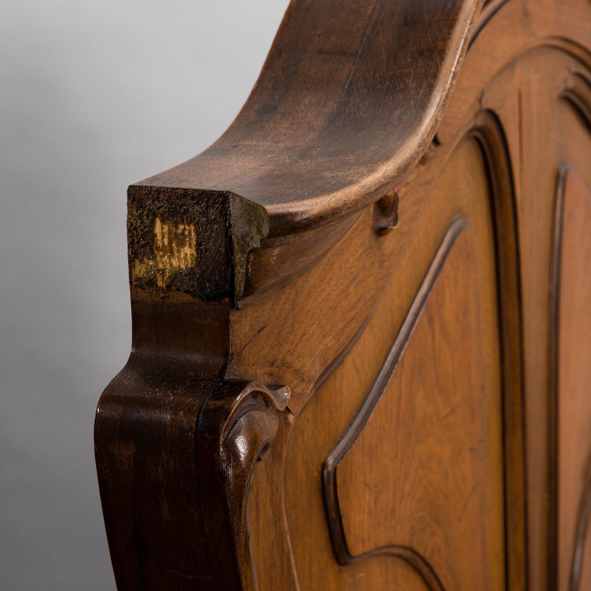 A pair of early 20th Century art nouveau style beds.