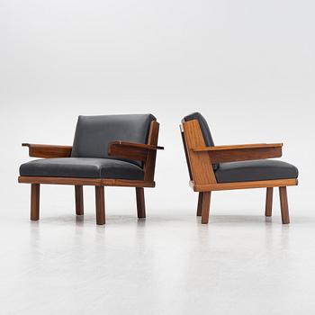 A pair of 1960's/70's armchairs.