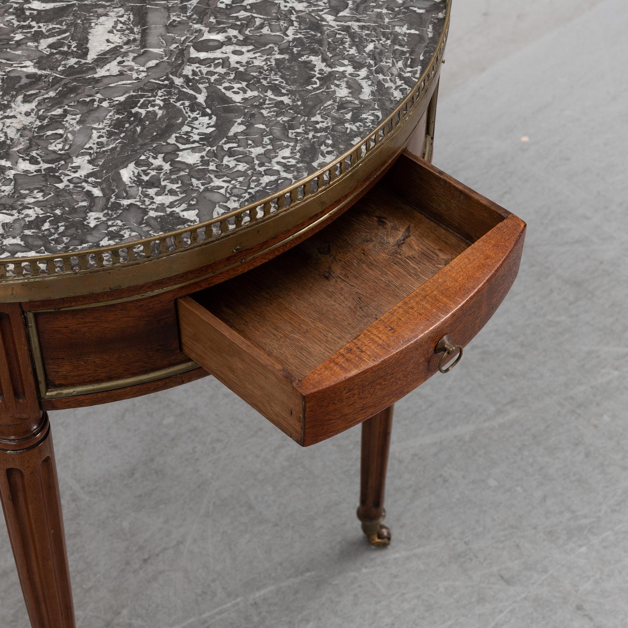 A Louis XVI-style table end of the  19th Century.