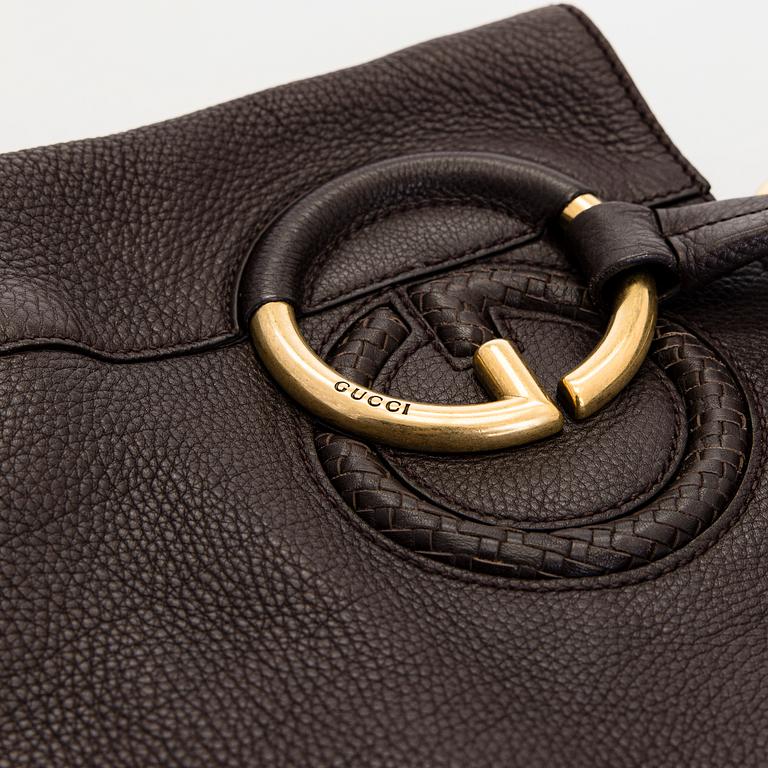 Gucci, an "Interlocking G" bag.