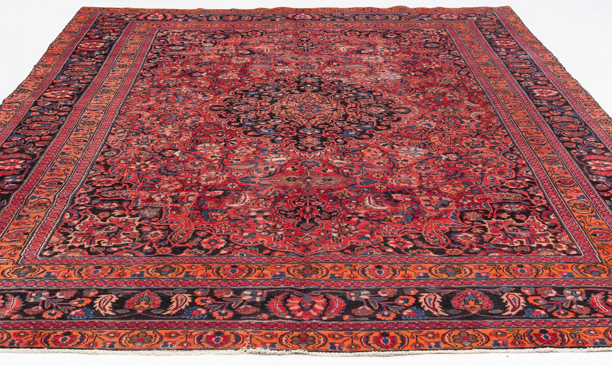 An oriental carpet, c. 401 x 295 cm.