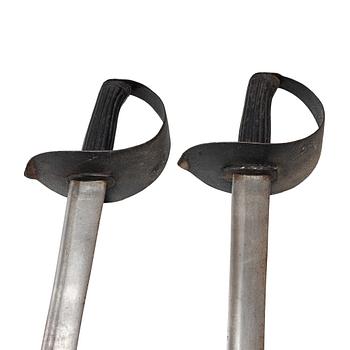 Two 19th century naval cutlasses.