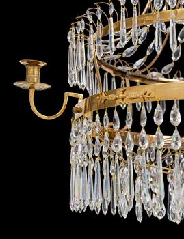 A late Gustavian gilt brass and cut glass seven-light chandelier, Stockholm, late 18th century.