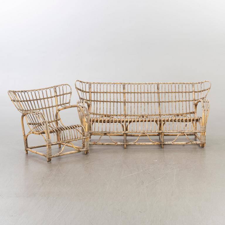 A sofa and a easy chair mid 20th century possibly by Viggo Boesen, Denmark.