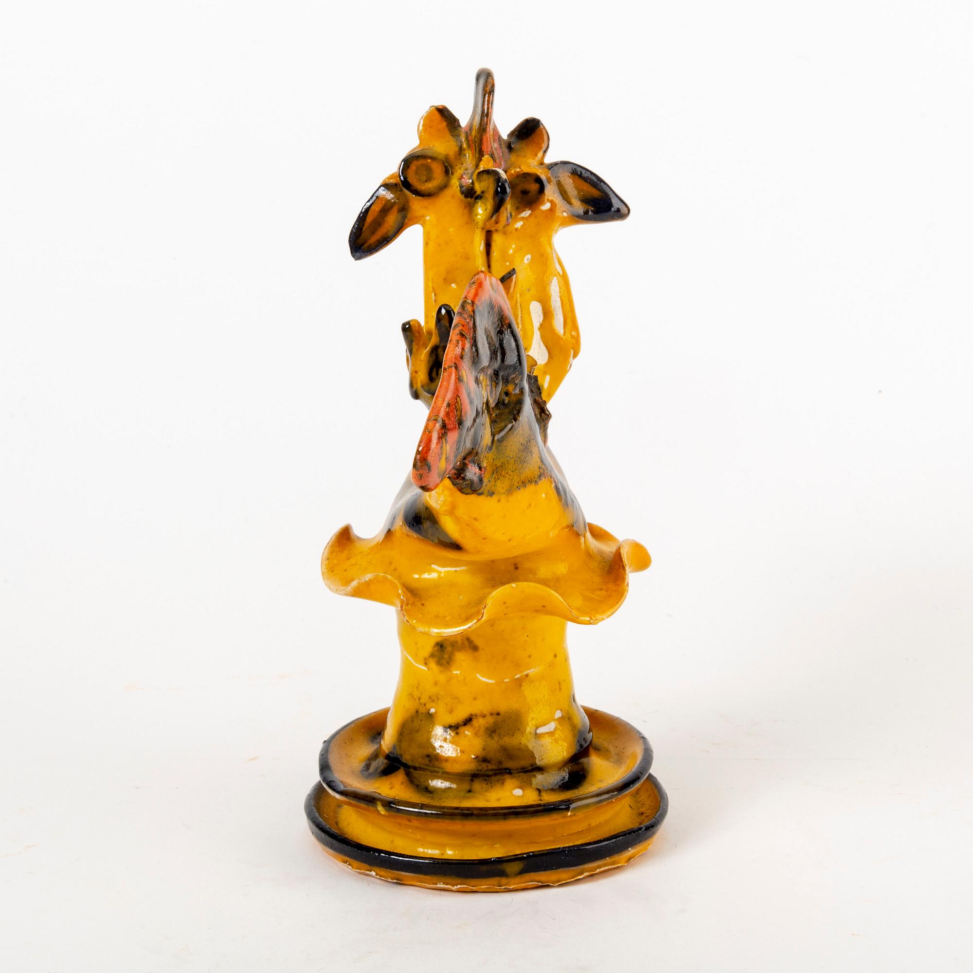 A signed Ulrica Hydman-Vallien stoneware figurine.
