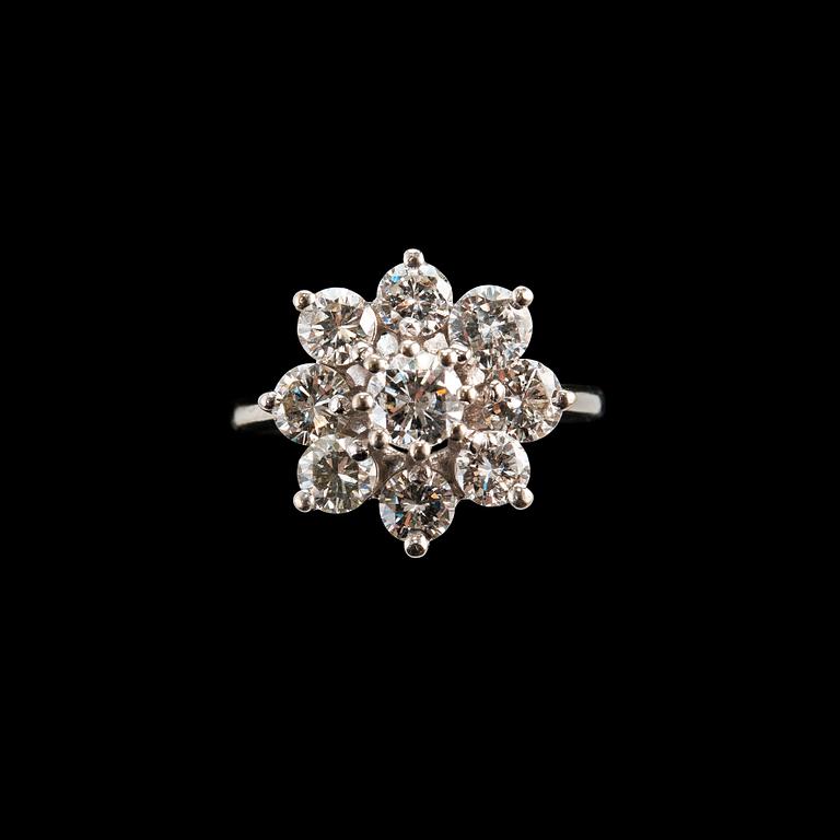 SORMUS, briljanttihiottuja timantteja 1.65 ct. Keskikivi n. 0.35 ct. 14K valkokultaa. Koko 17+, paino 5,1 g.