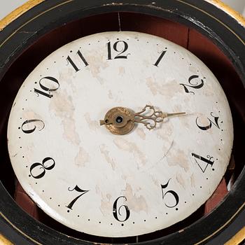 A grandfather clock, 19th century.