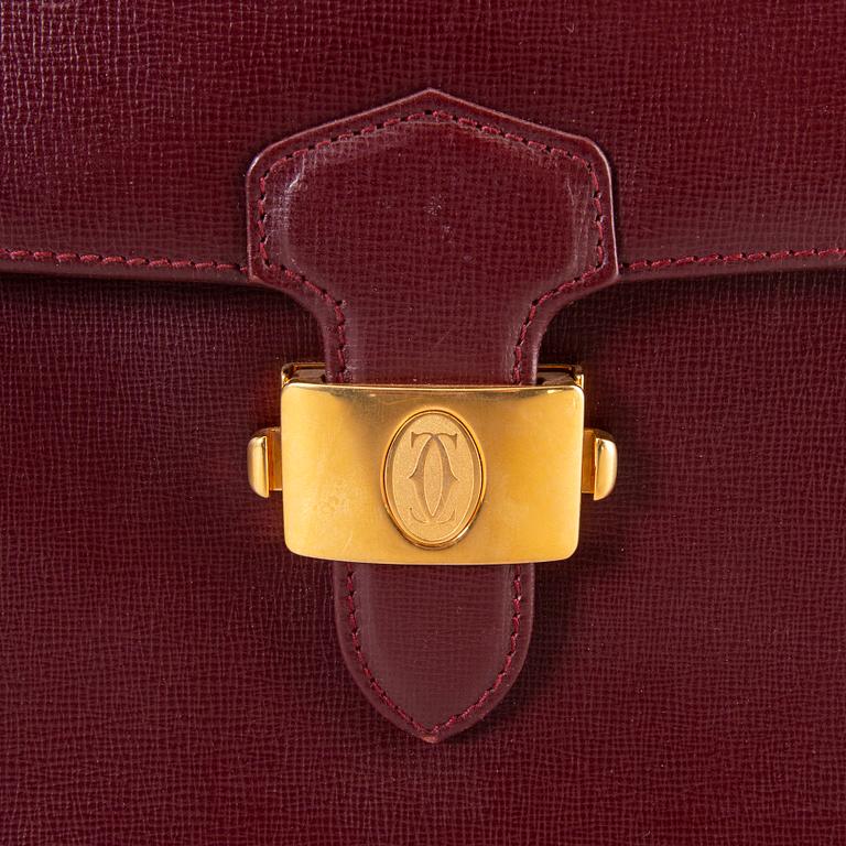 A Cartier leather briefcase.
