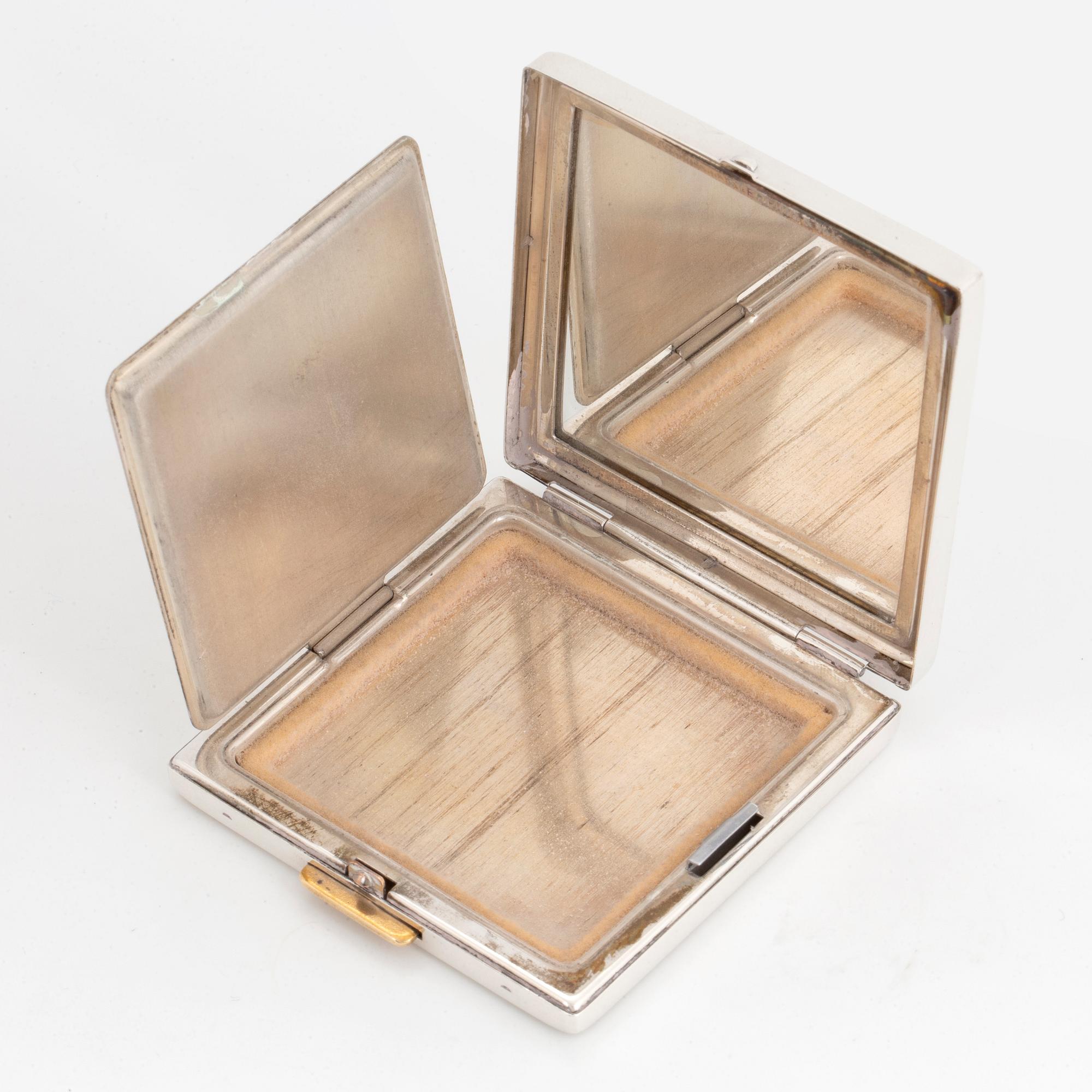 Puderdosa silver och 14K guld med fasettslipade safirer.