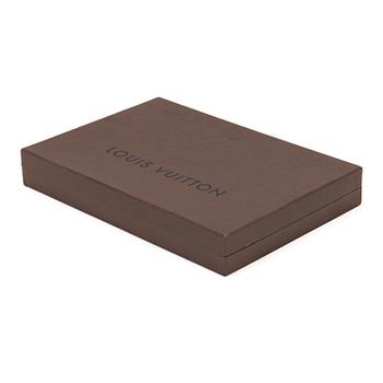 Louis Vuitton, a 'Monogram Classic Shawl'.