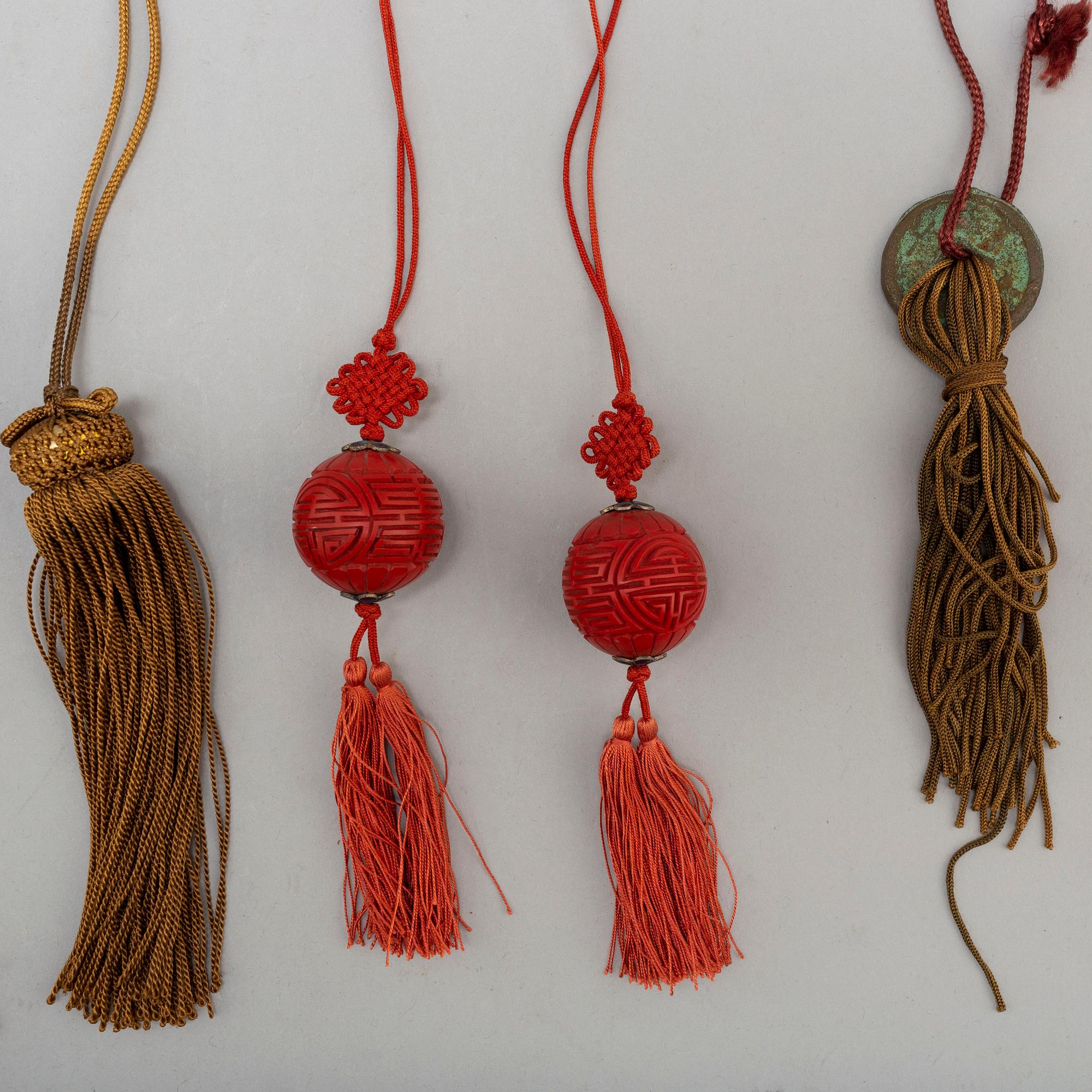 Eight (6+2) tassles, porcelain and bronze, Japan, 20th century.