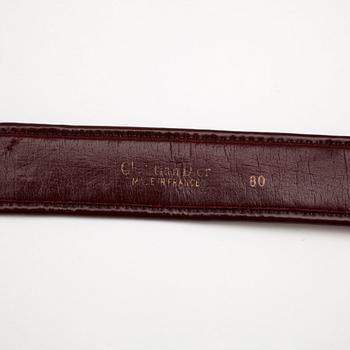 CHRISTIAN DIOR, a red monogram canvas belt.